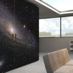 Modern kitchen with galaxy-themed wall in Manhattan.