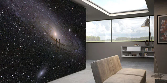 Modern kitchen with galaxy-themed wall in Manhattan.