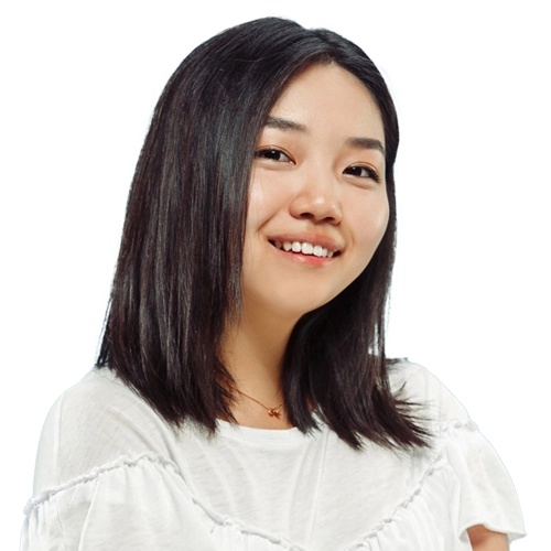 Smiling person in a modern kitchen setting, Manhattan